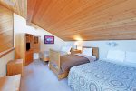 Loft has 2 Full Beds and a Twin Bed and a TV
